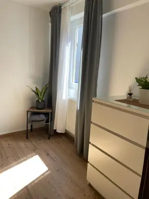 Ein Bett oder Betten in einem Zimmer der Unterkunft Charmante Wohnung in Burgnähe