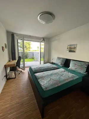 Ein Bett oder Betten in einem Zimmer der Unterkunft Ferienwohnung Hantmann