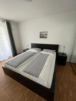 Ein Bett oder Betten in einem Zimmer der Unterkunft Ferienwohnung Hantmann