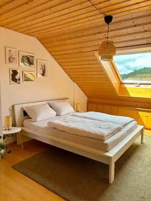 Ein Bett oder Betten in einem Zimmer der Unterkunft Apartment Minneburgblick
