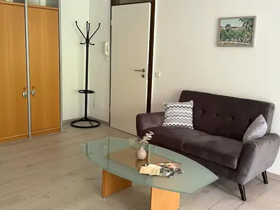 Ein Sitzbereich in der Unterkunft Ferienwohnung Bühler-Kurparkresidenz