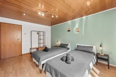 Ein Bett oder Betten in einem Zimmer der Unterkunft Amalfi A06 - für 6 PP - 3 Zi - 6 Betten - Terrasse inkl smart TV