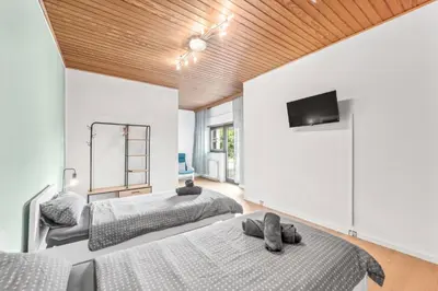 Ein Bett oder Betten in einem Zimmer der Unterkunft Amalfi A06 - für 6 PP - 3 Zi - 6 Betten - Terrasse inkl smart TV