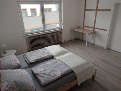 Ein Bett oder Betten in einem Zimmer der Unterkunft Schwandorf22