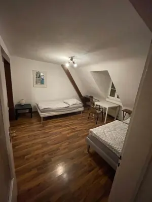 Ein Bett oder Betten in einem Zimmer der Unterkunft Monteurwohnung Holländer