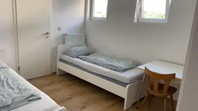 Ein Bett oder Betten in einem Zimmer der Unterkunft Hauptstraße 90