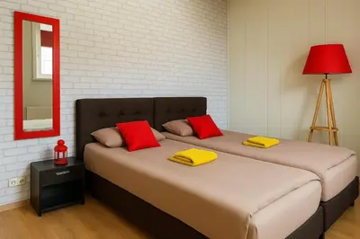 Ein Bett oder Betten in einem Zimmer der Unterkunft LENASTAY I Apartment mit Parkplatz & High-Speed-WLAN Zentrum Kaiserslautern