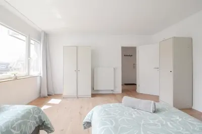 Ein Bett oder Betten in einem Zimmer der Unterkunft nJoy! Central & Pleasant Pforzheim - Balkon