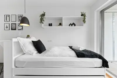 Ein Bett oder Betten in einem Zimmer der Unterkunft Modern, Zentral, Homeoffice, Netflix