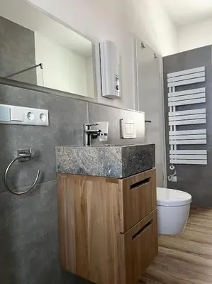 Ein Badezimmer in der Unterkunft Moderne, stilvolle Ferienwohnung in Eich