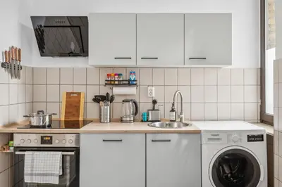 Küche/Küchenzeile in der Unterkunft FABYLOUS Homes City Apartment I Gruppen I Waschtrockner I Balkon I belebte Lage