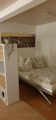 Ein Bett oder Betten in einem Zimmer der Unterkunft Gästehaus Ringhof
