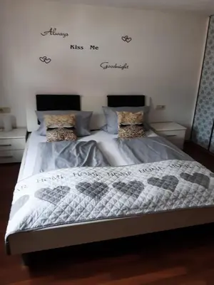 Ein Bett oder Betten in einem Zimmer der Unterkunft Ferienwohnung Frank