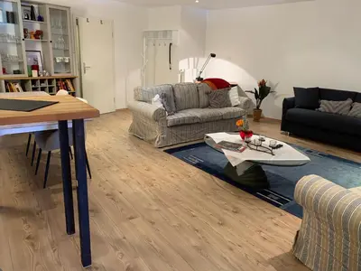 Ein Sitzbereich in der Unterkunft Apartment am historischen Rathaus