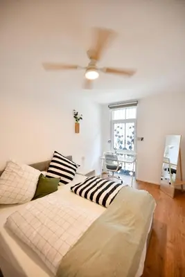 Ein Bett oder Betten in einem Zimmer der Unterkunft Ferienloft 'Weinstube Fridrich'