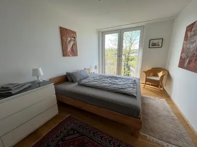 Ein Bett oder Betten in einem Zimmer der Unterkunft Luxuswohnung in Villa mit fantastischem Blick