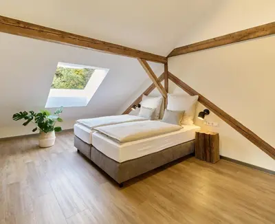 Ein Bett oder Betten in einem Zimmer der Unterkunft Die Alte Schmelz