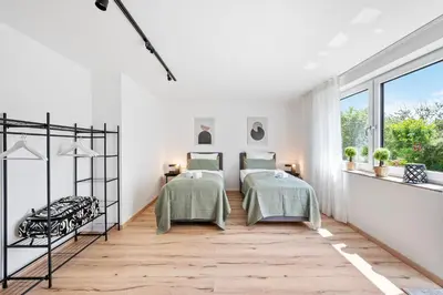 Ein Bett oder Betten in einem Zimmer der Unterkunft Neu mit Terrasse! 2BR 4Beds- schönste Aussicht - frisch saniert- barrierefreie! -Mozart ZWEI - Bietigheim