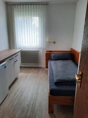 Ein Sitzbereich in der Unterkunft Monteurwohnung - Handwerkerwohnung Jesse Bad König