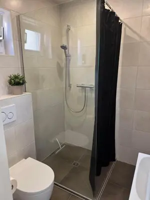 Ein Badezimmer in der Unterkunft Gästehaus Schröder