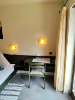 Ein Bett oder Betten in einem Zimmer der Unterkunft Grünvogels Landgasthof zum Grünen Baum