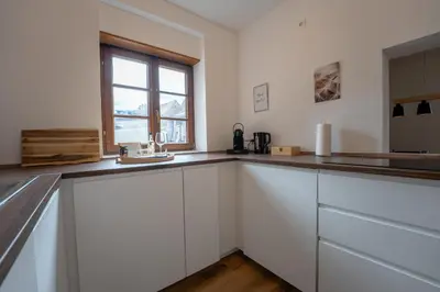 Küche/Küchenzeile in der Unterkunft Design-Fachwerk-Suite - Balkon-Parkplatz-Therme