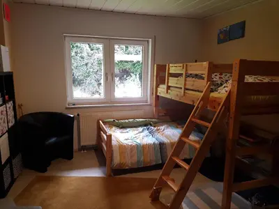 Ein Bett oder Betten in einem Zimmer der Unterkunft FeWo in Heddesbach