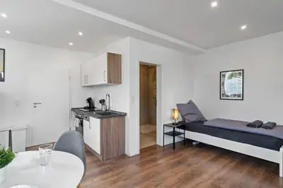 Ein Sitzbereich in der Unterkunft RO01 Schickes 1-Zimmer Apartment