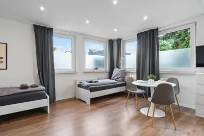 Ein Bett oder Betten in einem Zimmer der Unterkunft RO01 Schickes 1-Zimmer Apartment