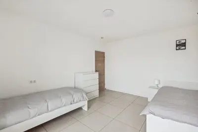 Ein Bett oder Betten in einem Zimmer der Unterkunft MONTEUR - Unterkunft für bis zu 7 Personen in 64569 Nauheim - GG09