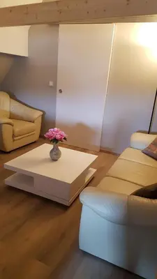 Ein Sitzbereich in der Unterkunft Neue wunderschöne Ferienwohnung direkt im Herzen von Rockenhausen