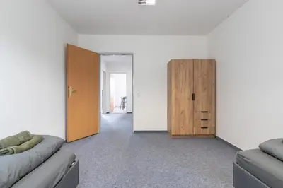 Ein Sitzbereich in der Unterkunft Monteurapartment I 8 Betten I Küche I Waschmaschine I Balkon