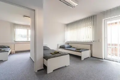 Ein Sitzbereich in der Unterkunft Monteurapartment I 8 Betten I Küche I Waschmaschine I Balkon