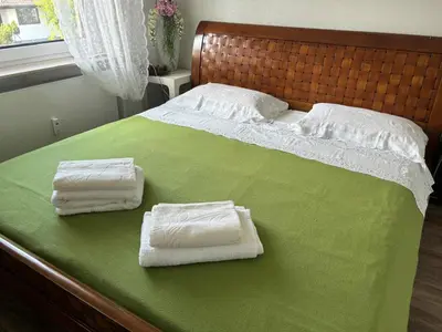 Ein Bett oder Betten in einem Zimmer der Unterkunft bei Tante Tina