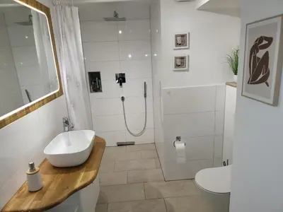 Ein Badezimmer in der Unterkunft Pension Kostera