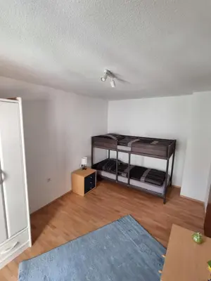 Ein Bett oder Betten in einem Zimmer der Unterkunft Ferienwohnung Heppenheim an der Bergstraße WHG 5