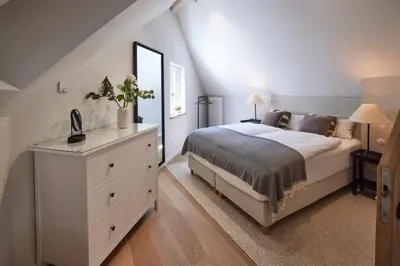 Ein Bett oder Betten in einem Zimmer der Unterkunft Deidesheimer Haus