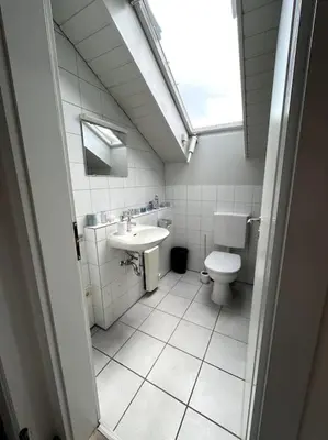 Ein Badezimmer in der Unterkunft Moderne Wohnung mit Dachterrasse