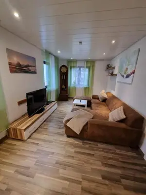 Ein Sitzbereich in der Unterkunft Ferienwohnung Elsenztal