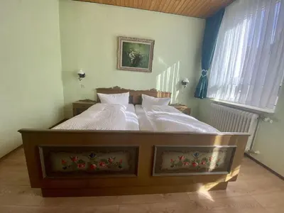 Ein Bett oder Betten in einem Zimmer der Unterkunft Pension Walther