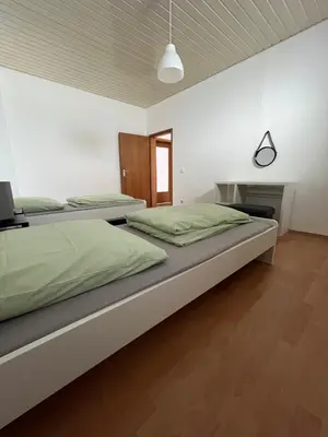 Ein Bett oder Betten in einem Zimmer der Unterkunft Charmantes Apartment