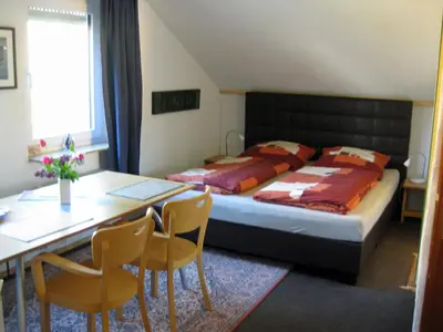 Ein Bett oder Betten in einem Zimmer der Unterkunft Eva und Wolf Apartments