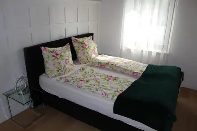 Ein Bett oder Betten in einem Zimmer der Unterkunft Ferienwohnung Maria! Respektvoller Umgang
