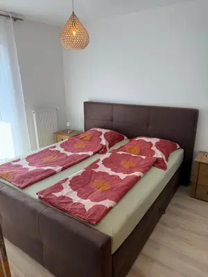 Ein Bett oder Betten in einem Zimmer der Unterkunft Pfalzgrün - Wohnen mit Stil