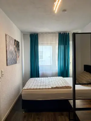 Ein Bett oder Betten in einem Zimmer der Unterkunft SiYen two with 24h Check-in
