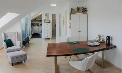 Ein Sitzbereich in der Unterkunft Modernes Balkon Apart