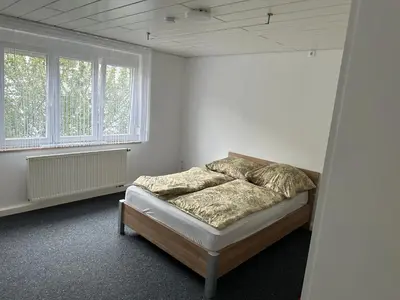 Ein Bett oder Betten in einem Zimmer der Unterkunft Comfort Apartments Heilbronn