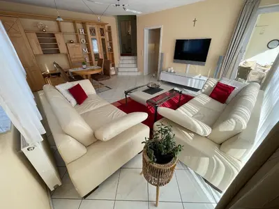 Ein Sitzbereich in der Unterkunft Ferienwohnung FlatNETT