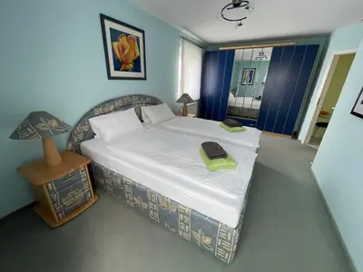 Ein Bett oder Betten in einem Zimmer der Unterkunft Ferienwohnung FlatNETT