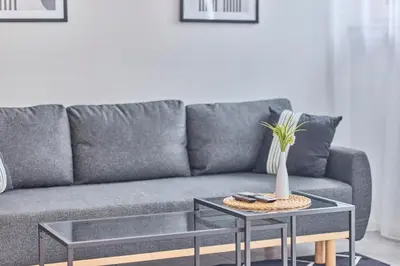 Ein Sitzbereich in der Unterkunft Zentrale Lage Netflix Queensize Bett